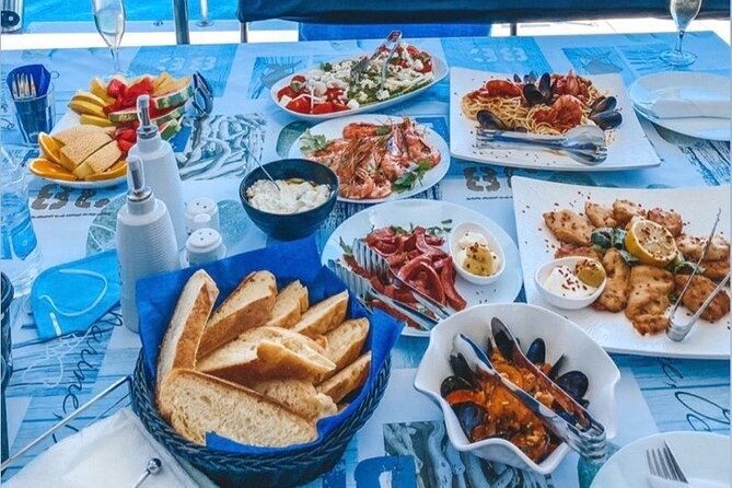 Half-Day Exclusive Catamaran Cruise in Santorini with Meal and Open Bar - Santorini Volcano and Hot Springs: Swim Time, Not a Theme Park