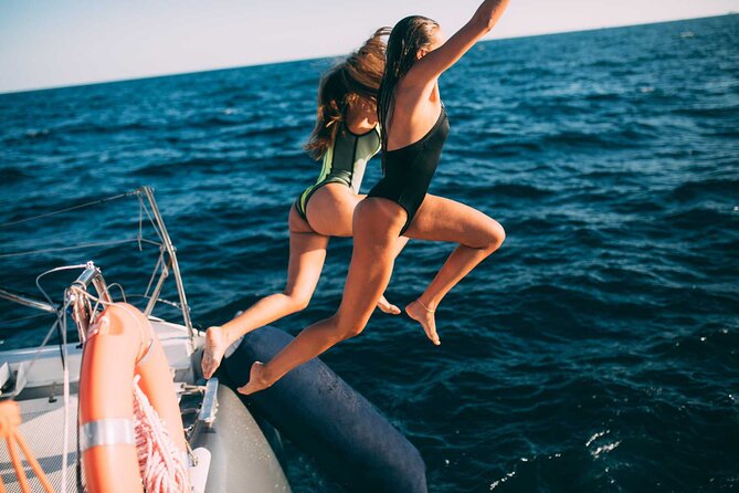 Luxury Catamaran Cruise with Brunch and Unlimited Drinks - Balinese beds, lounging, and when to think about deck safety