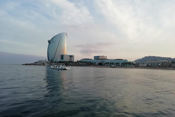 Luxury Private Sunset Cruise in Barcelona – Open Bar Included - The white drawbridge near the commercial port: a quirky highlight