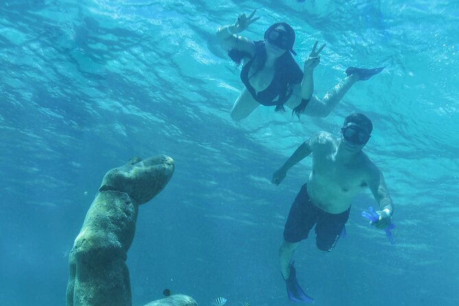 Luxury Sailing Experience to Isla Mujeres with Lunch & Open Bar - Costs to Know Before You Go: Dock Fee and What’s Not Included