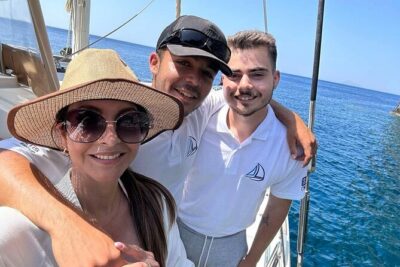 Luxury Santorini Sunset Cruise: Dinner, BBQ, Open Bar, Transfers - The sail route: Red and White Beach scenery with Akrotiri Lighthouse views