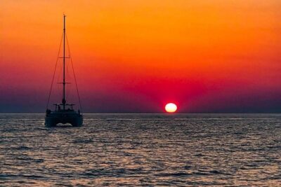 Luxury Small-Group Catamaran Cruise with BBQ, Open bar & Transfer - Palea Kameni hot springs: warm water and the 100m swim rule