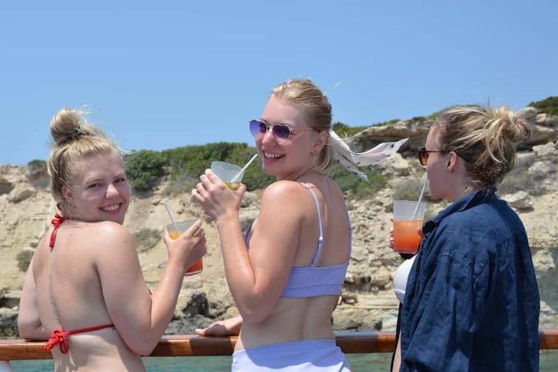 Paphos: Wave Dancer Half-Day Cruise with BBQ and Open Bar - Entertainment onboard: singers, host banter, and the pace of the day