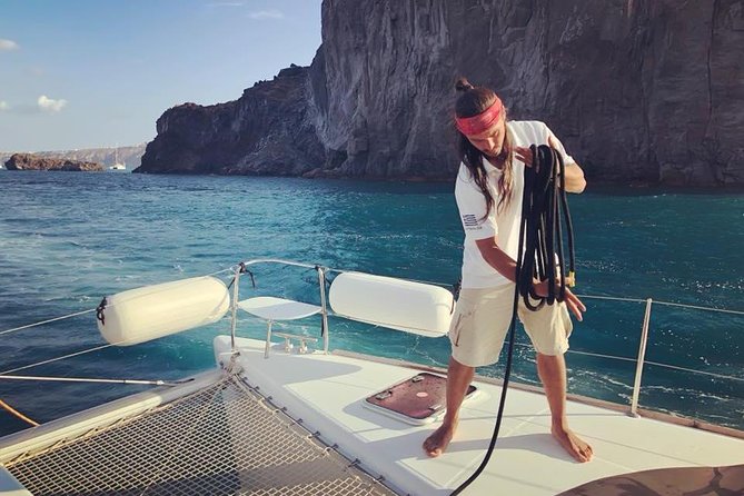 Premium Small-Group Catamaran Cruise with BBQ, Open Bar, Transfer - Palea Kameni hot springs: warm sulfur water, crowds, and the open-water swim