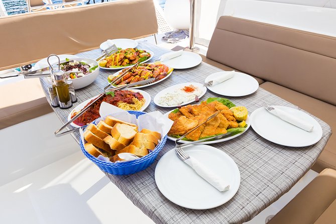 Premium Small-Group Catamaran Cruise with BBQ, Open Bar, Transfer - Nea Kameni, Thirasia, and the caldera coastline: why sea level views beat the bus