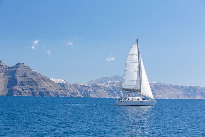 Premium Small-Group Catamaran Cruise with BBQ, Open Bar, Transfer - Evening vs daytime sail: sunset is the payoff, but wind can get real