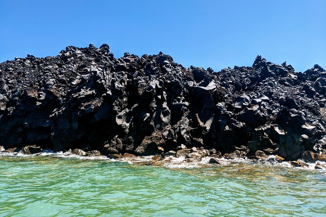 Private Full-Day Motor Yacht Cruise with Meal, Open Bar+Transfers - Vlychada to the Red/White beach loop: your first big swim section