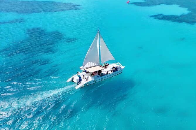 Punta Cana Catamaran Party– Snorkeling, Open Bar, Music & Pickup - Hotel pickup and the “don’t miss the boat” reality
