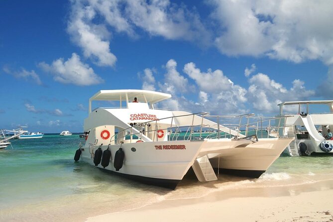 Punta Cana: Catamaran Tour, Reef Snorkeling and Unlimited Drinks! - Onboard setup: drinks, snacks, air-conditioning, and that slide
