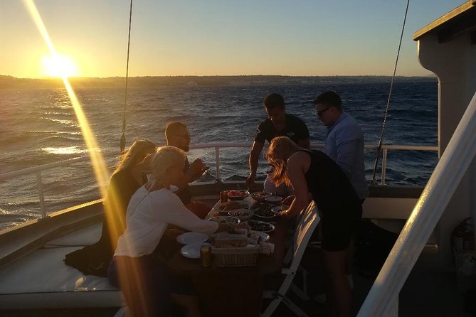 Rhodes Exclusive Sunset tour Cocktail Open bar Gourmet Live Music - Greek buffet dinner: what it tastes like on a moving boat