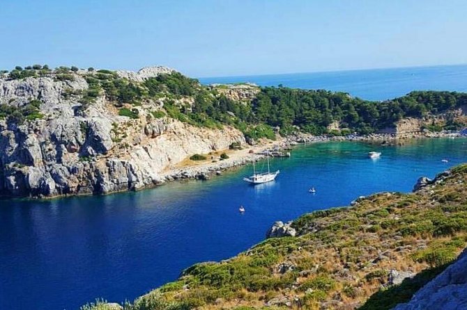Rhodes Exclusive Swim Cruise Cocktail Open bar & Gourmet Buffet - Between bays: passing Faliraki Beach from the water