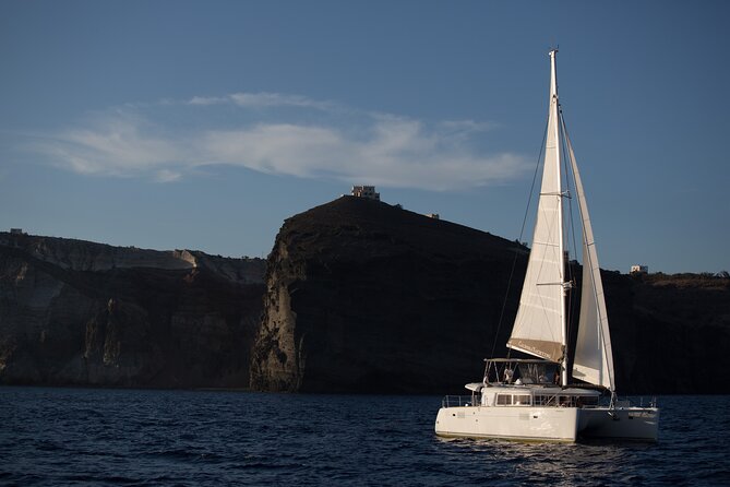 Santorini Caldera Gold Day Cruise with BBQ on board and Open Bar - White Beach: Private Feeling, Crystal Water, Short Visit