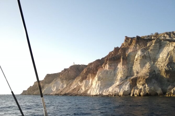 Santorini Catamaran Cruise with Fresh Meal and Open Bar - Around Nea Kameni: seeing the active volcano area from the water