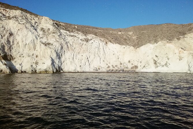 Santorini Catamaran Cruise with Fresh Meal and Open Bar - Palea Kameni hot springs: the warm sulfur swim stop