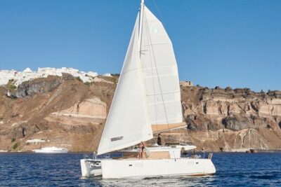 Santorini Platinum Catamaran Cruise with Meal, BBQ and Open Bar - Red Beach: the cliff colors you came for