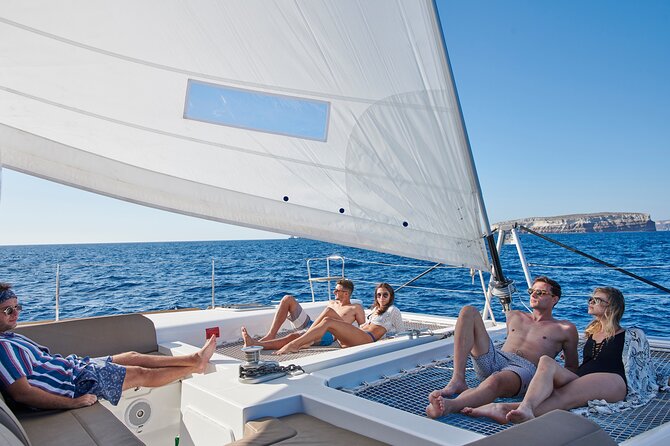Santorini Platinum Catamaran Cruise with Meal, BBQ and Open Bar - Santorini Volcano hot springs: water, caves, and a quick reality check