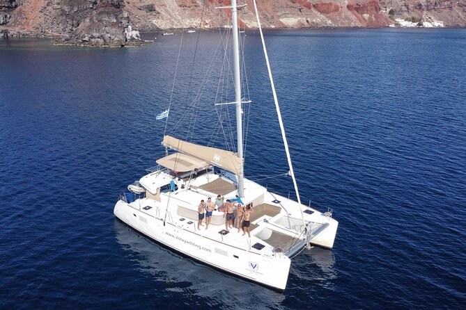Santorini Platinum Catamaran Cruise with Meal, BBQ and Open Bar - Thirassia island: swimming and the onboard BBQ feast