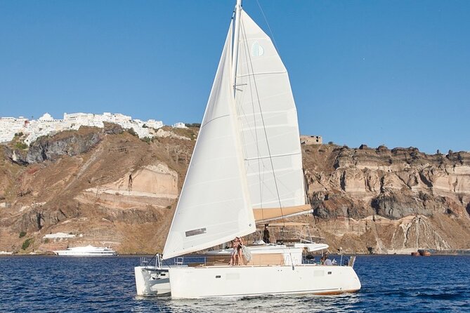 Santorini Platinum Catamaran Cruise with Meal, BBQ and Open Bar - Red Beach: the cliff colors you came for