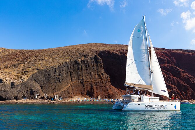 Santorini Private Catamaran Cruise with BBQ, Open Bar & Transfers - A private day on Santorini’s water that feels built for real relaxation