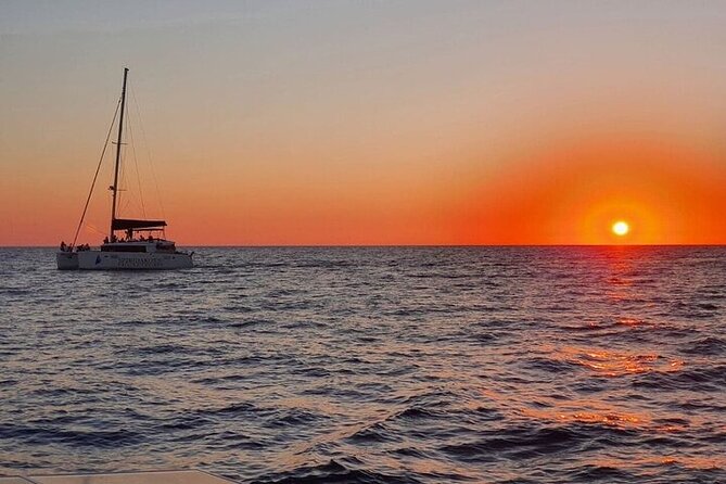 Santorini Private Catamaran Cruise with BBQ, Open Bar & Transfers - Mesa Pigadia bay: a swim session without the beach logistics