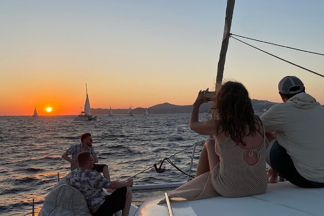 Santorini Sunset Sailing Cruise: Dinner, BBQ, Open Bar, Transfers - Key highlights you’ll feel immediately