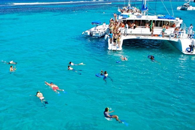 Shared Dunn's River Falls Snorkel Cruise with Music, Open Bar from Runaway Bay - Catamaran snorkel stop: coral reefs and reef fish, gear included
