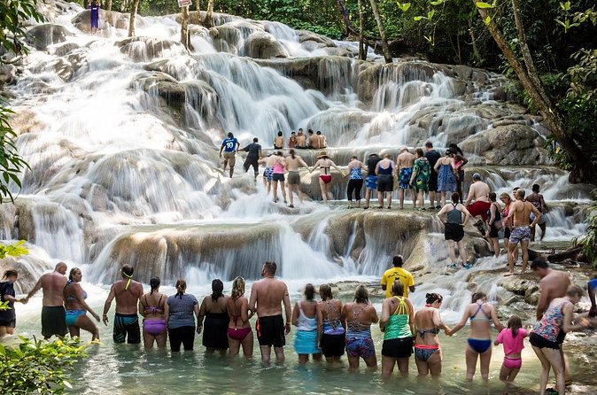 Shared Dunn's River Falls Snorkel Cruise with Music, Open Bar from Runaway Bay - Dunn’s River Falls climb with Big foot: terraces, pools, and a real guide