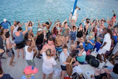 Shared Dunn's River Falls Snorkel Cruise with Music, Open Bar from Runaway Bay - On-board party time: music, open bar, and a Jamaican patty snack